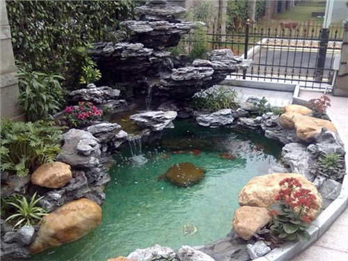 上海别墅假山鱼池水景设计施工